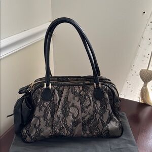 Valentino Garavani Black Leather Satchel with Lace Overlay